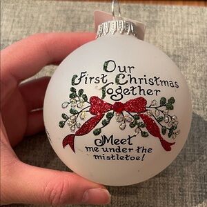 Holiday Ornament with Red Bow and Greenery